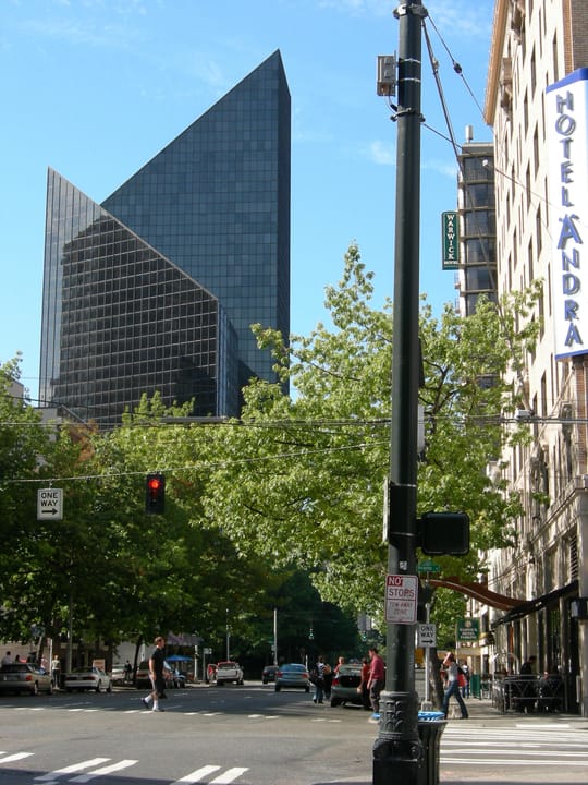 Looking north from the corner of Fourth and Virginia in Downtown Seattle. The Fourth and Blanchard Building, at left, is known to locals as "the Darth Vader Building" because its color and the slope of its roof evoke Vader's helmet.