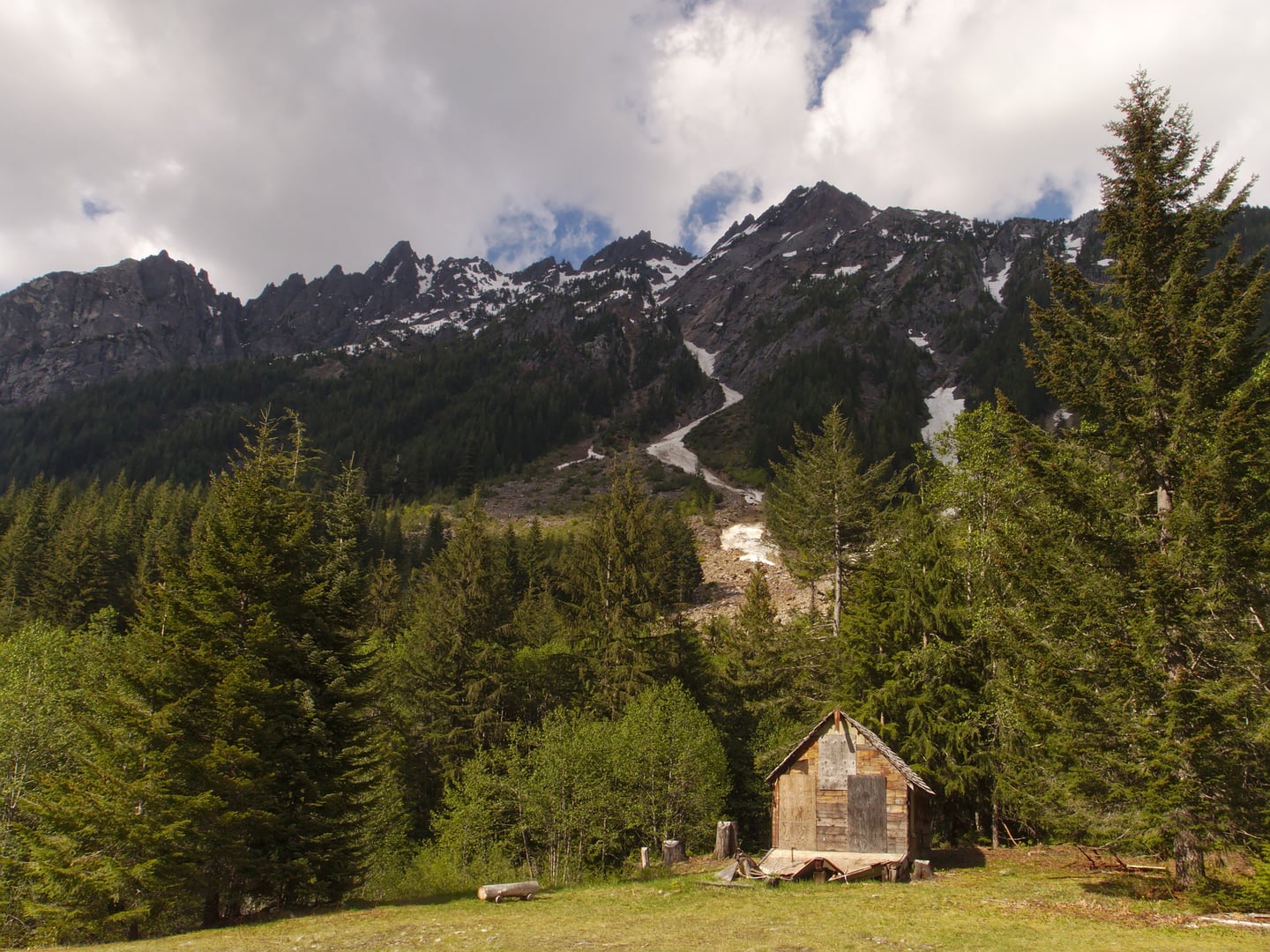 The Monte Cristo townsite looking northeast, May 2014, showing the ruined foundations and forest of the former 1890s mining boomtown in Snohomish County, Washington