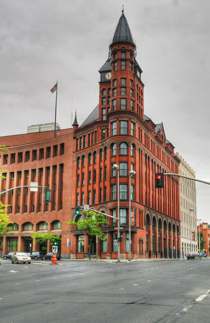 Exterior of the 1891 Review Building with its 146-foot candle-snuffer tower on Riverside Avenue in downtown Spokane, Washington, home of The Spokesman-Review.