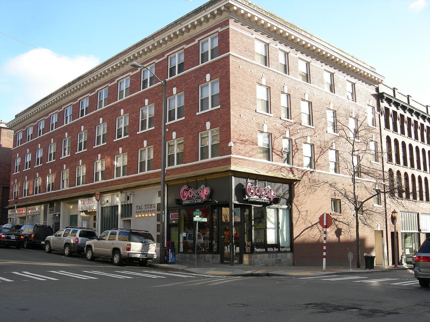 The Rex Apartments building at 657 S King Street in Seattle's International District, with Tai Tung restaurant occupying the ground floor since 1935.