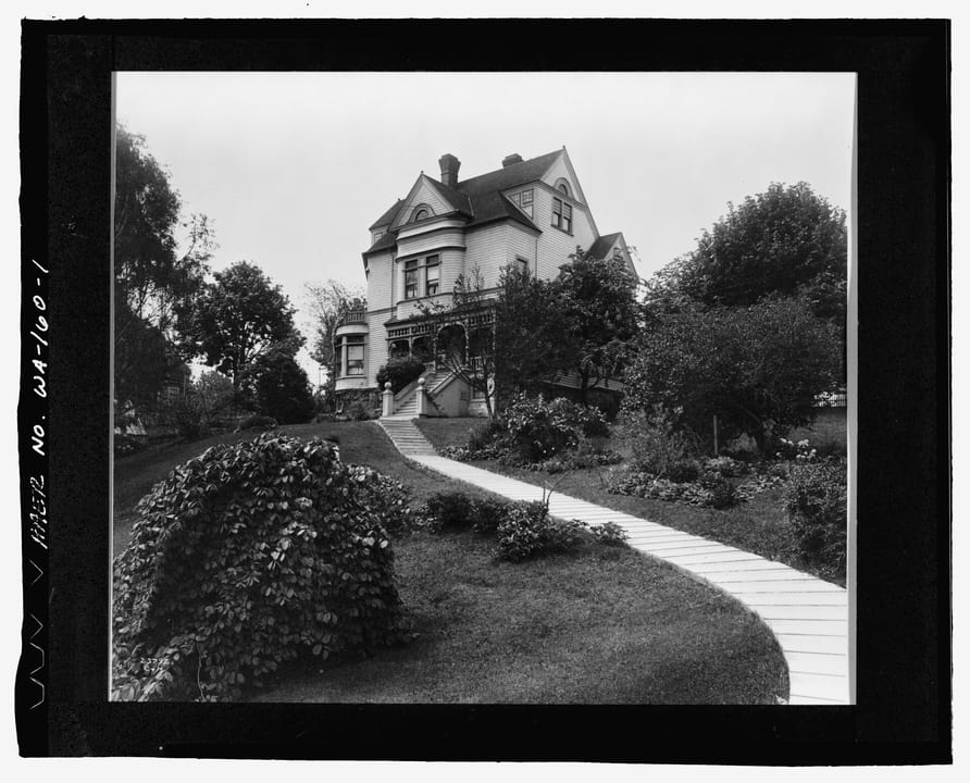 Exterior of the 1889 Walker-Ames House, a Queen Anne Victorian on Rainier Avenue in Port Gamble, Washington