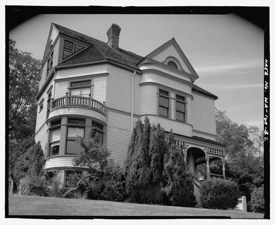 The Walker-Ames House's turret and bay window, facing northwest, Rainier Avenue, Port Gamble, Washington (HAER WA-160-2).