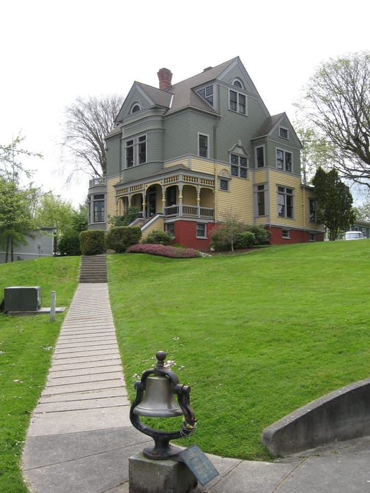 The Walker-Ames House from the front walkway and lawn, Port Gamble, Washington, 2008.