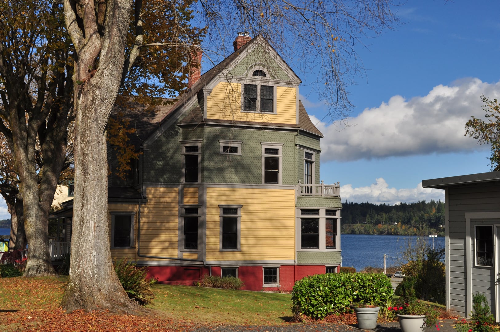 Exterior of the 1889 Walker-Ames House, a Queen Anne Victorian on Rainier Avenue in Port Gamble, Washington