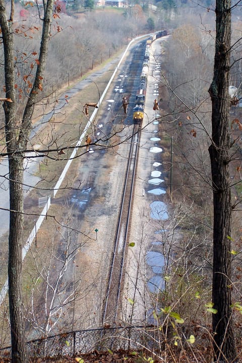 From the John Henry overlook in WV, we see a CSX train approaching Big Bend Tunnel on its way to Hinton, WV.