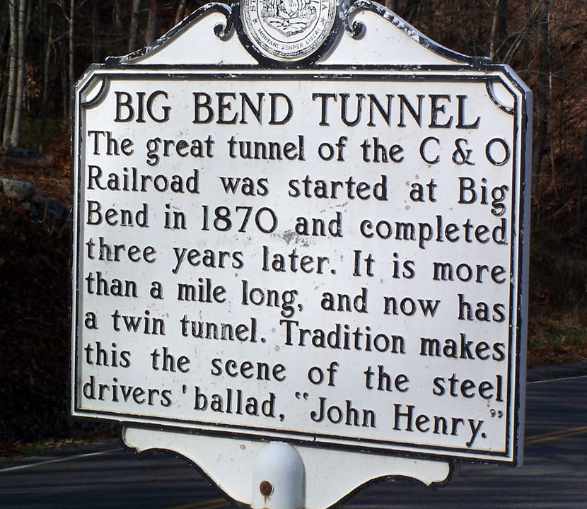 West Virginia. This sign explains about the tunnel that is far below the John Henry overlook. Travel along WV Routes 63, 12 and 3 between Ronceverte and Hinton is both historic and beautiful.