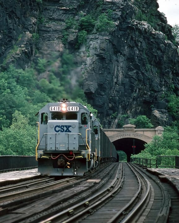 Amtrak Train # 29, “The Capitol Limited” is on-time (5:15 PM EST) as it crosses the Shenandoah River in Harper’s Ferry, WV.  The train is slowing as Harper’s Ferry is a scheduled station stop. “The Capitol Limited” is scheduled to arrive in Chicago at 8:45 AM tomorrow morning.