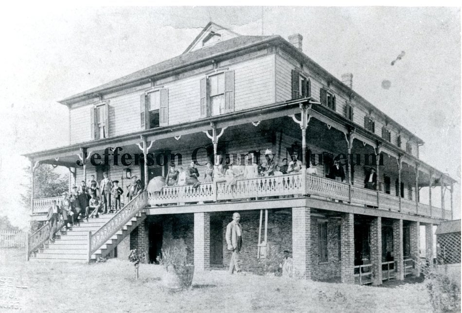 Historic 1893 photograph of the Hill Top House Hotel perched on a cliff above Harpers Ferry, West Virginia — the founding-era image of the Black-owned hotel