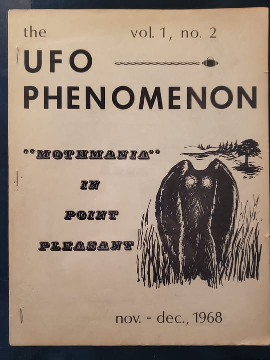 A vintage 1968 zine, 'The UFO Phenomenon: Mothmania in Point Pleasant', on display in the museum's archival collection.