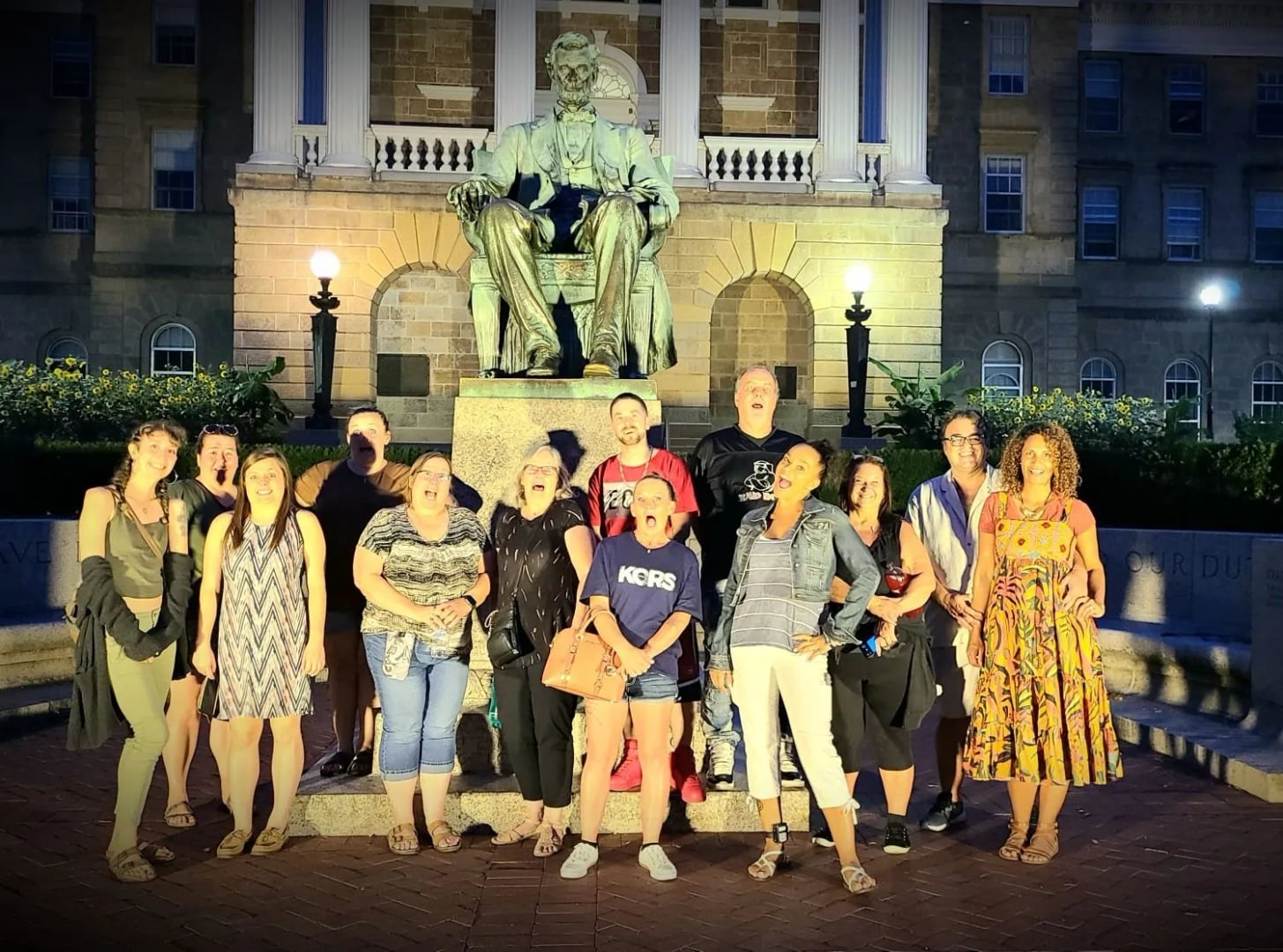 American Ghost Walks tour group on the University of Wisconsin Madison campus near the Abraham Lincoln statue on Bascom Hill