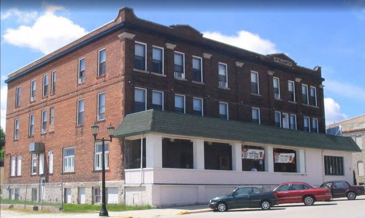 The Arts and Crafts facade of the Karsten Nest Hotel on Ellis Street in Kewaunee, Wisconsin, near the Lake Michigan shoreline