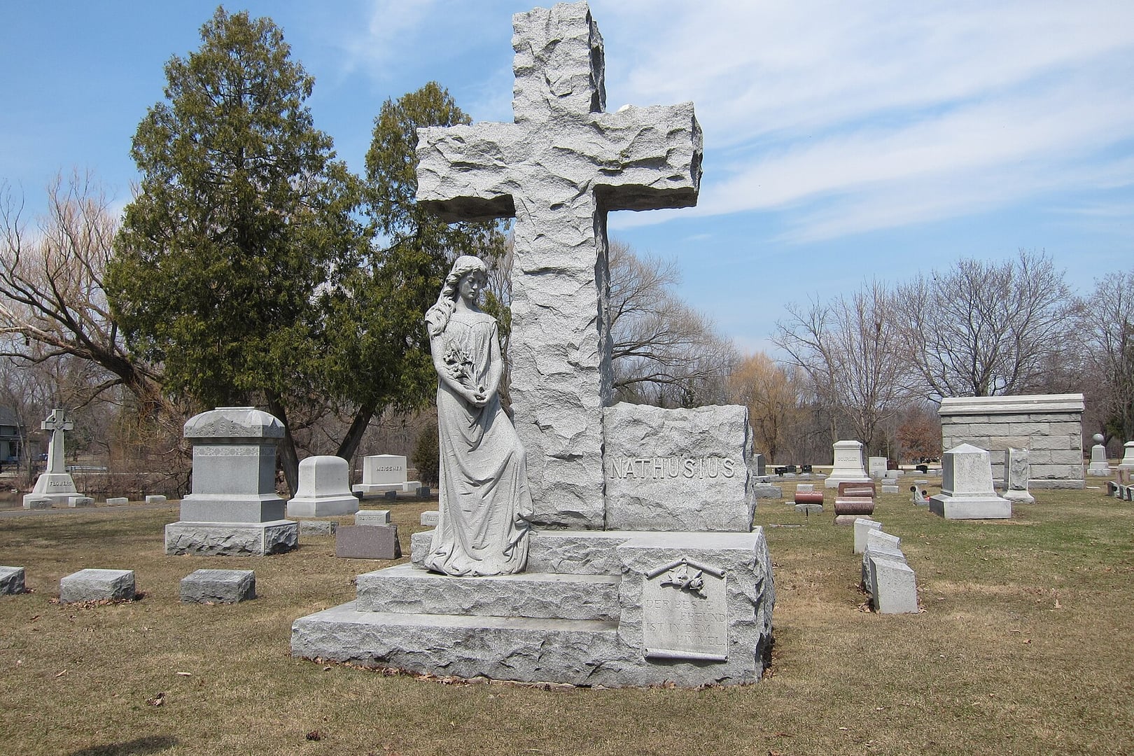 Historic gravesite monument at La Belle Cemetery in Oconomowoc, Wisconsin, a peaceful 1851 burial ground along the Oconomowoc River