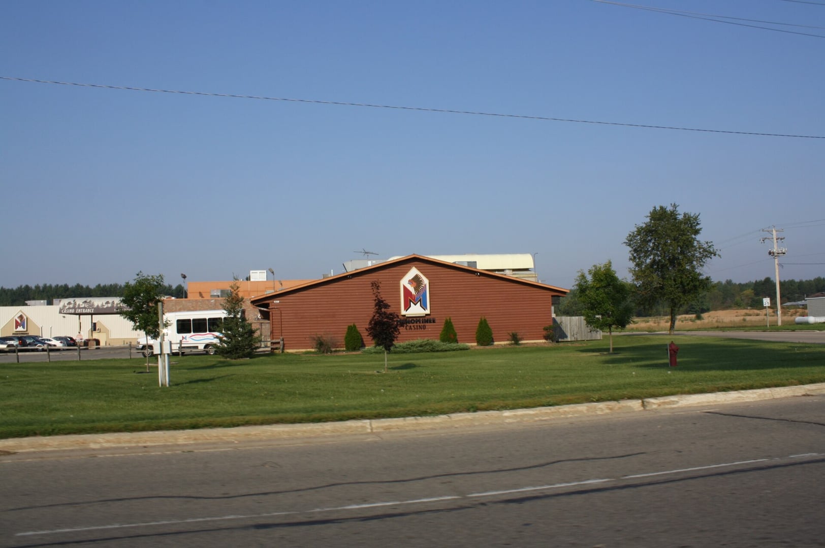 Exterior view of the Menominee Casino Bingo hotel building in Keshena, Wisconsin, photographed from Wisconsin Highway 55