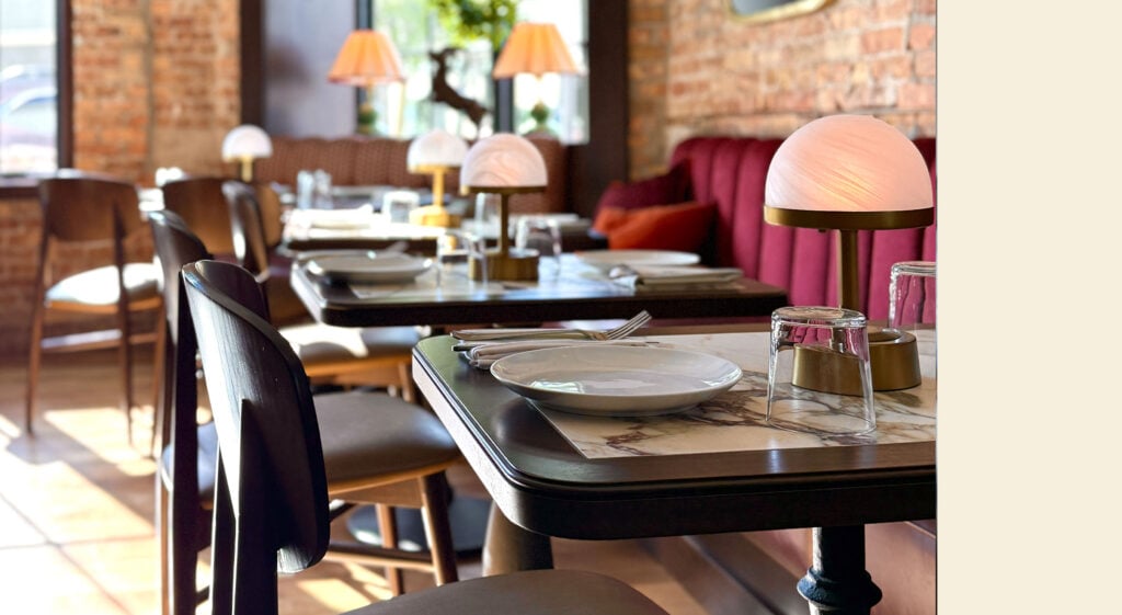 The Inn (Hartland) dining room interior in Hartland Wisconsin, the 1906 Pabst-era hotel reborn as a wood-fired restaurant