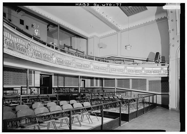 The balcony and auditorium seating inside the Atlas Theatre, Cheyenne, Wyoming, from Historic American Buildings Survey documentation (HABS No. WYO-77).
