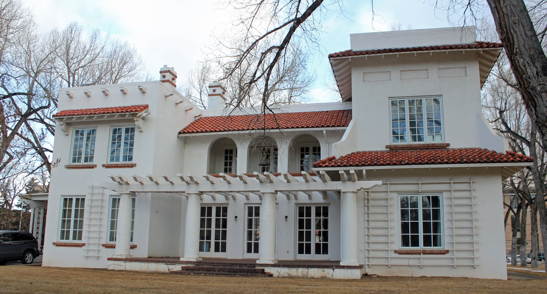 Exterior of the Cooper Mansion in Laramie, Wyoming, a 1921 Mission and Pueblo Revival home now used by the University of Wyoming