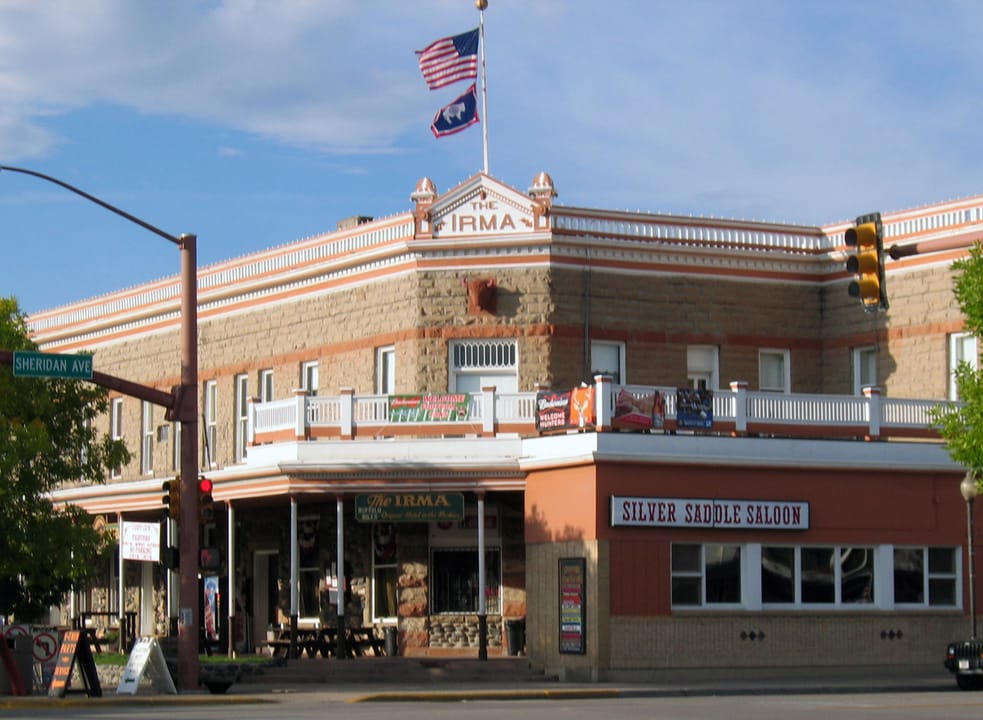 The corner of Buffalo Bill's Irma Hotel at Sheridan Avenue, Cody, Wyoming, with the Silver Saddle Saloon storefront at street level.