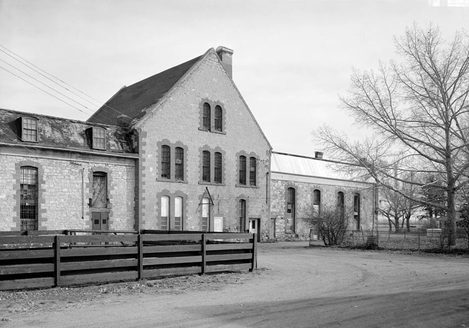 Historic facade of Wyoming Territorial Penitentiary stone main building in Laramie Wyoming